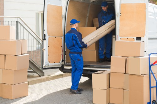 Man and van removals team working in a Brixton residential street