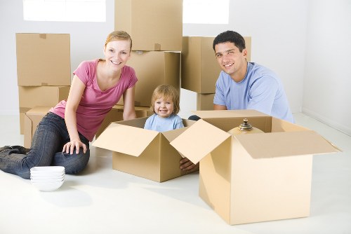Removal team planning a Brixton home move with boxes and furniture