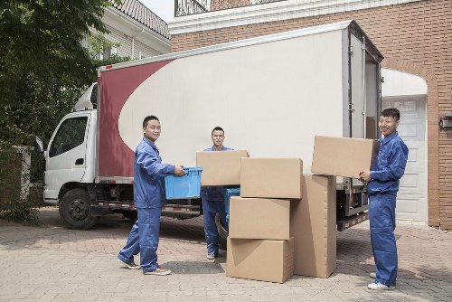Workers managing a careful property move with clear walkways