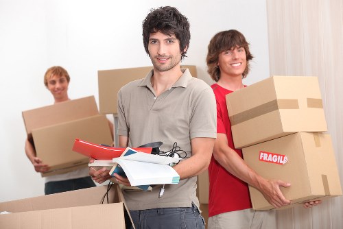 Professional man and van in Brixton handling furniture delivery