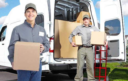 Moving checklist and labelled boxes for a Brixton removals service