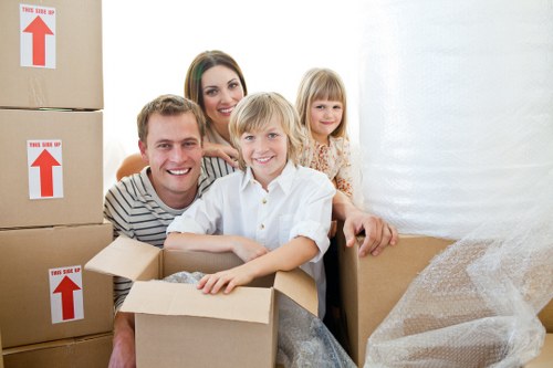 Packed boxes and furniture being prepared for a local relocation