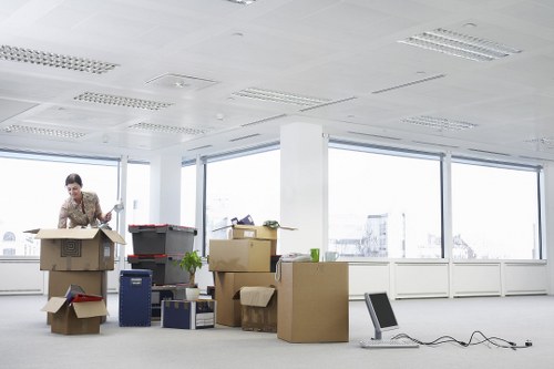 A moving team navigating a Brixton property with care